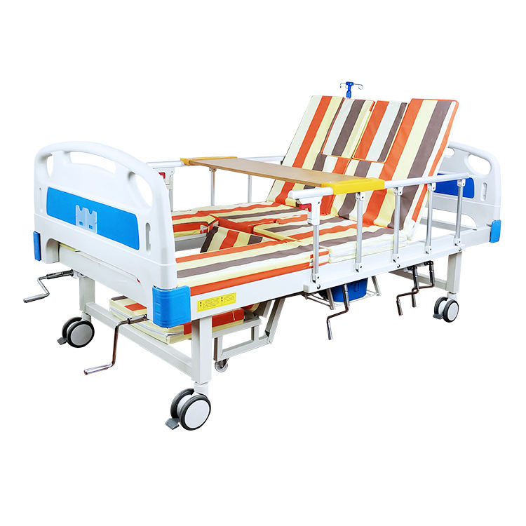 Heißverkaufs multifunktionaler Krankenhausbett-Kurbelbett Handbuch Umdrehung Krankenhaus Pflegebetten mit automatischer Toilette